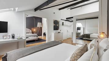 Premium bedding, down comforters, pillowtop beds, minibar