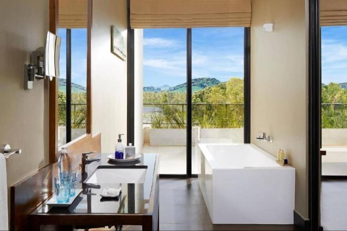 Cabezal de ducha tipo lluvia, artículos de tocador gratuitos