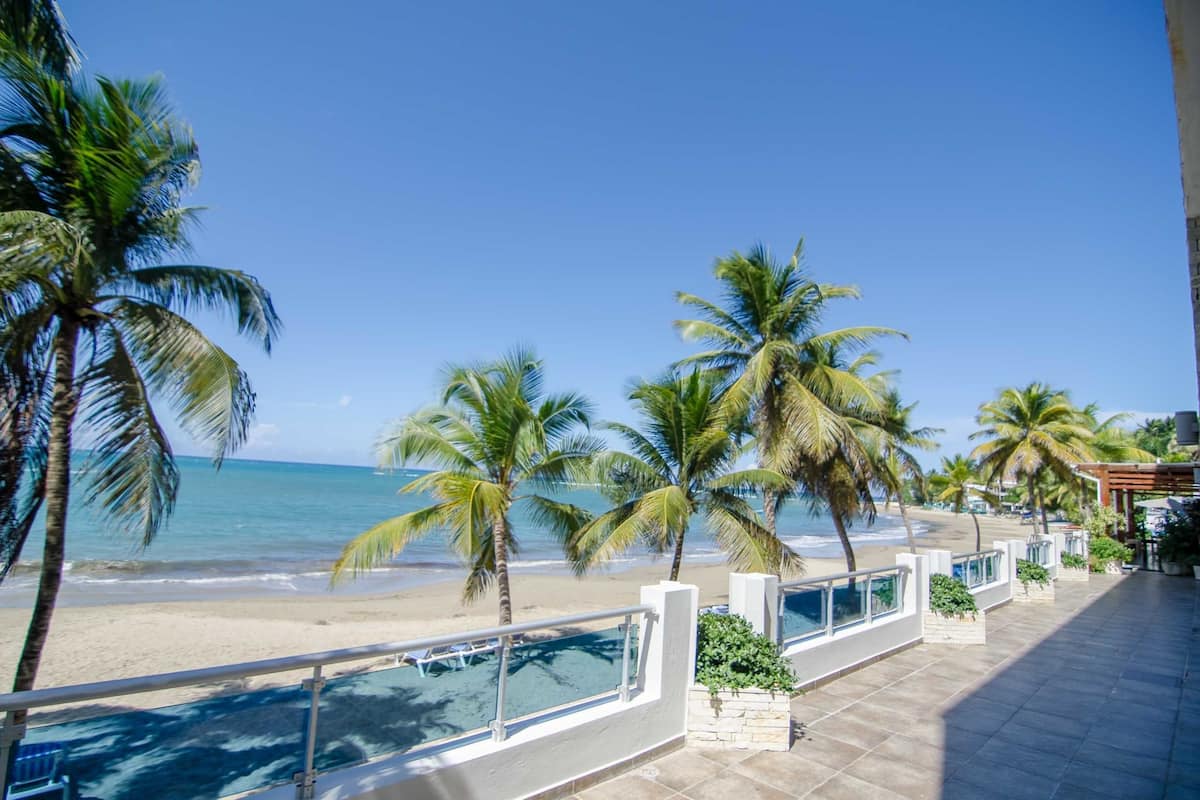 Beachfront Apartment, 2 Bedrooms, 1 Bathroom | Iron/ironing board, free WiFi