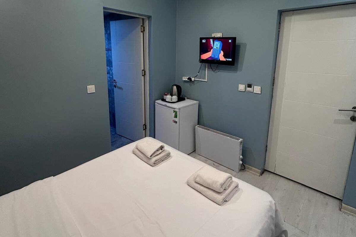 Economy tweepersoonskamer, 1 slaapkamer | 1 slaapkamer, luxe beddengoed, een gratis minibar, een kluis op de kamer