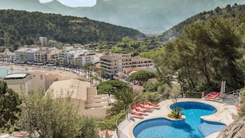 Outdoor pool, pool umbrellas, pool loungers