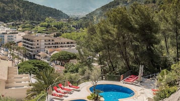 Outdoor pool, pool umbrellas, pool loungers