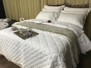 Minibar, desk, blackout curtains, iron/ironing board