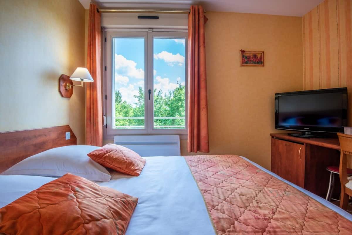 Chambre Double Confort, vue jardin | Minibar, bureau, rideaux occultants, Wi-Fi gratuit