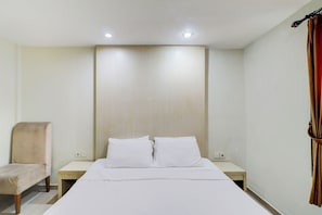 Deluxe Double Room | Premium bedding, desk, free WiFi, bed sheets - Collection O Near Bajra Sandi Monumen Formerly Grand Pondok Puri Ayu (Denpasar)