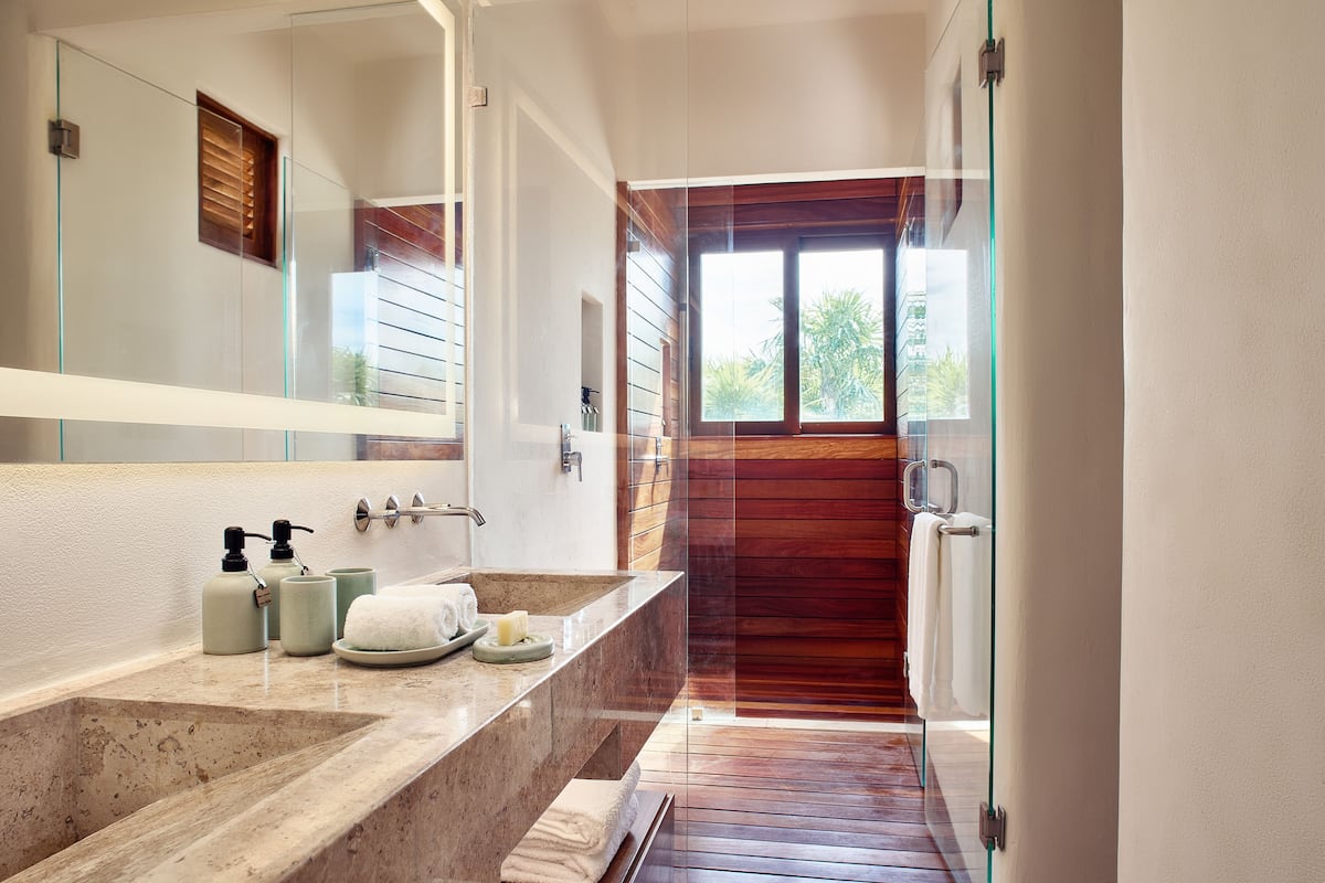 shower, rainfall showerhead, designer toiletries, hair dryer