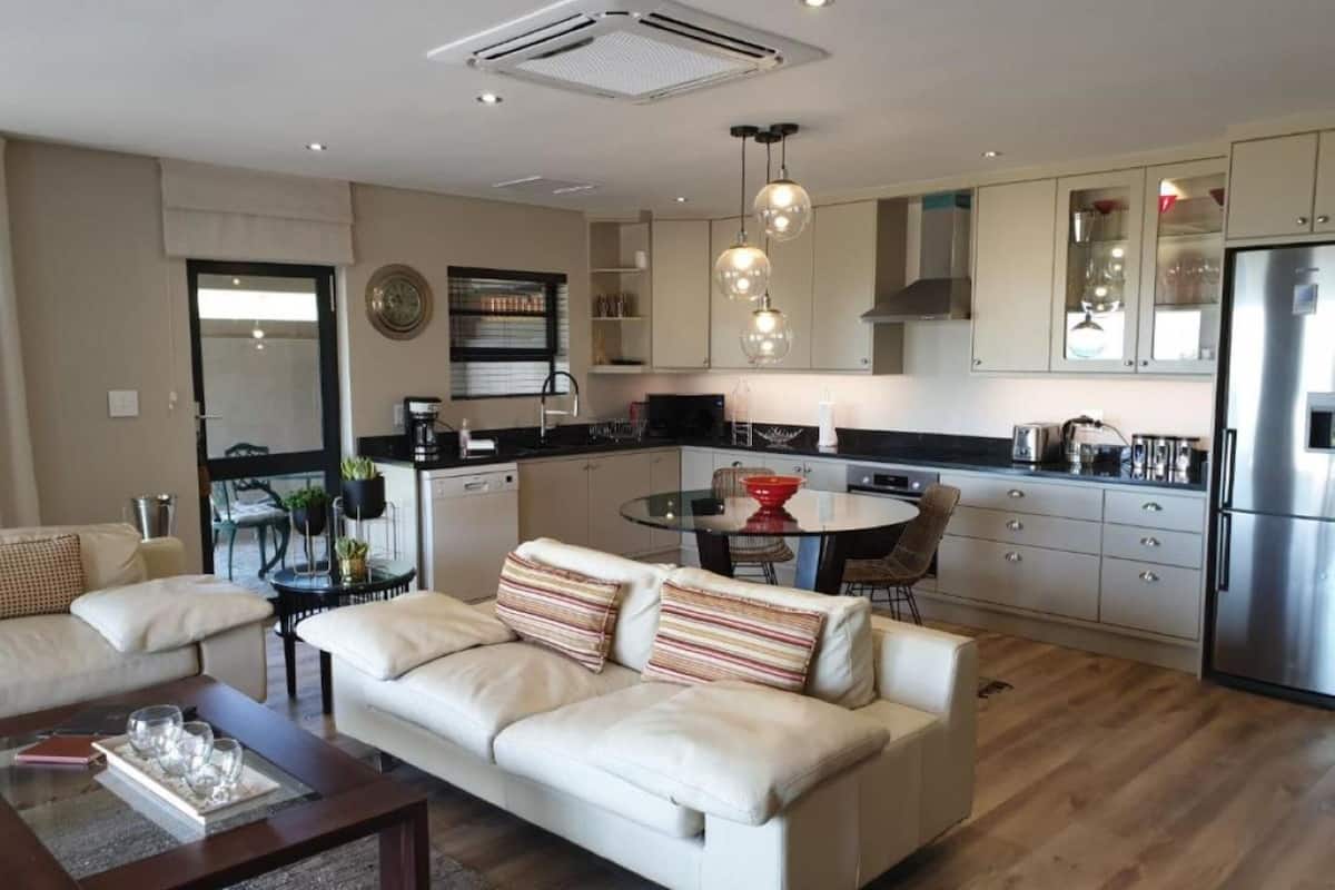 Luxury Apartment | Living area | Flat-screen TV