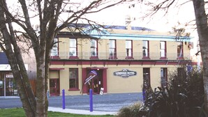 A two-story building with a sign for the Lumsden Hotel. - Lumsden Hotel (Lumsden)