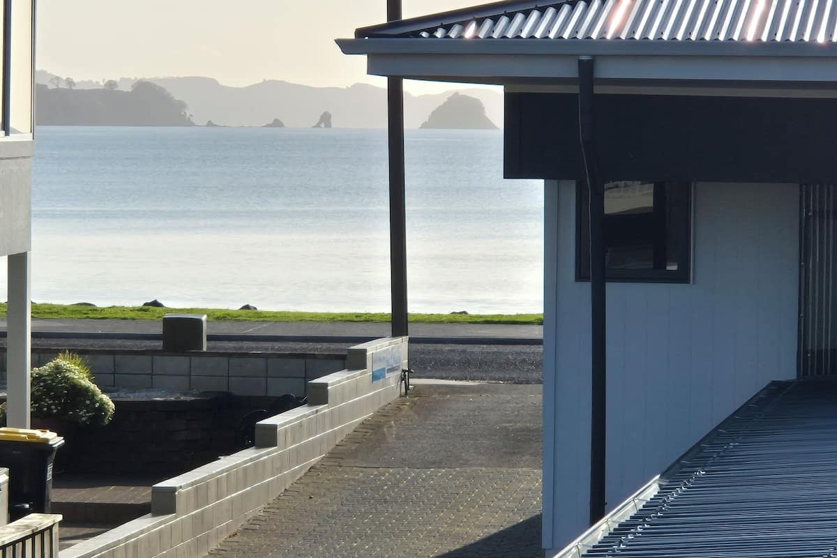 A building with a view of the sea.