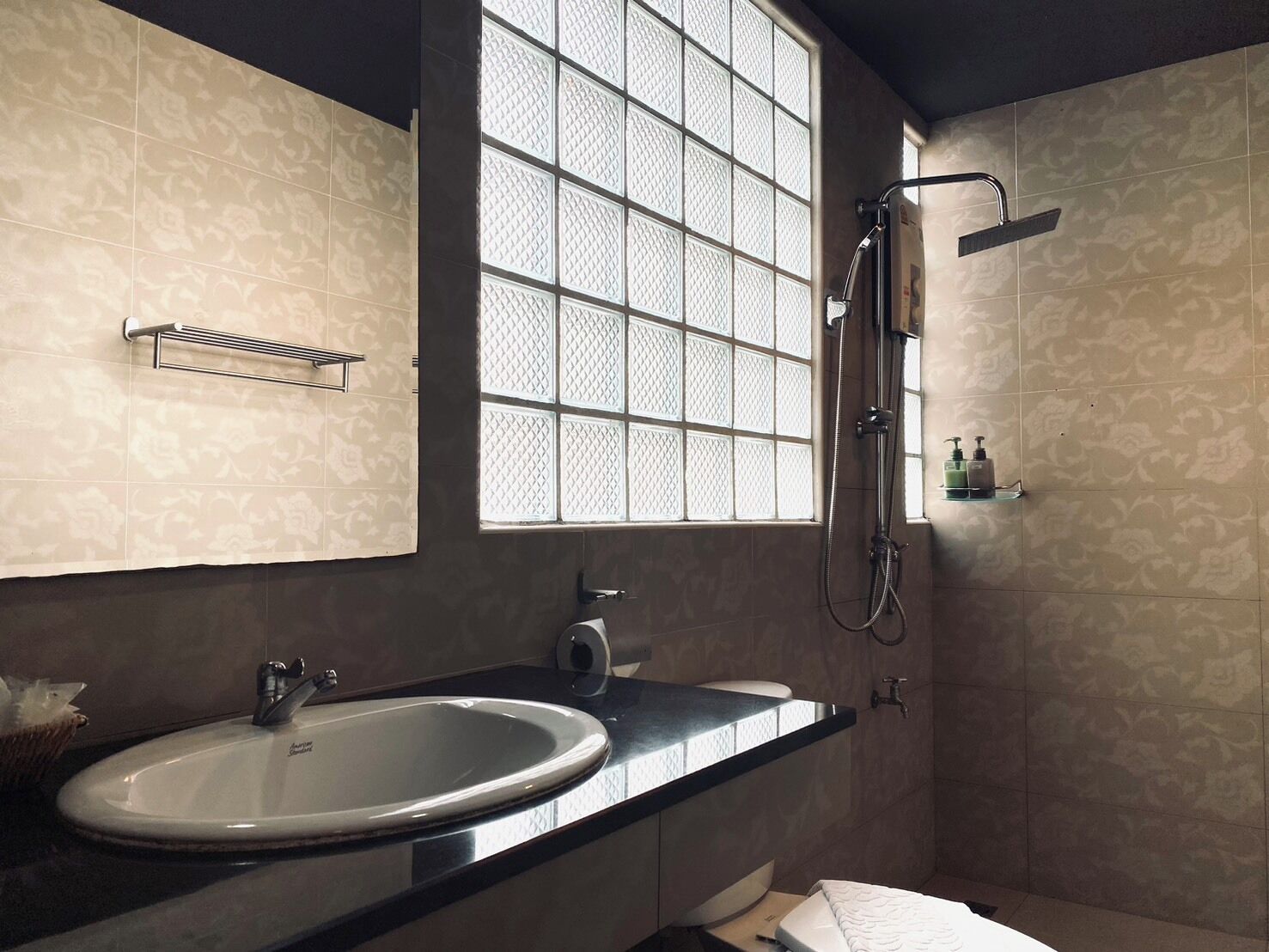 grand superior room | bathroom | shower, rainfall showerhead, free toiletries, hair dryer