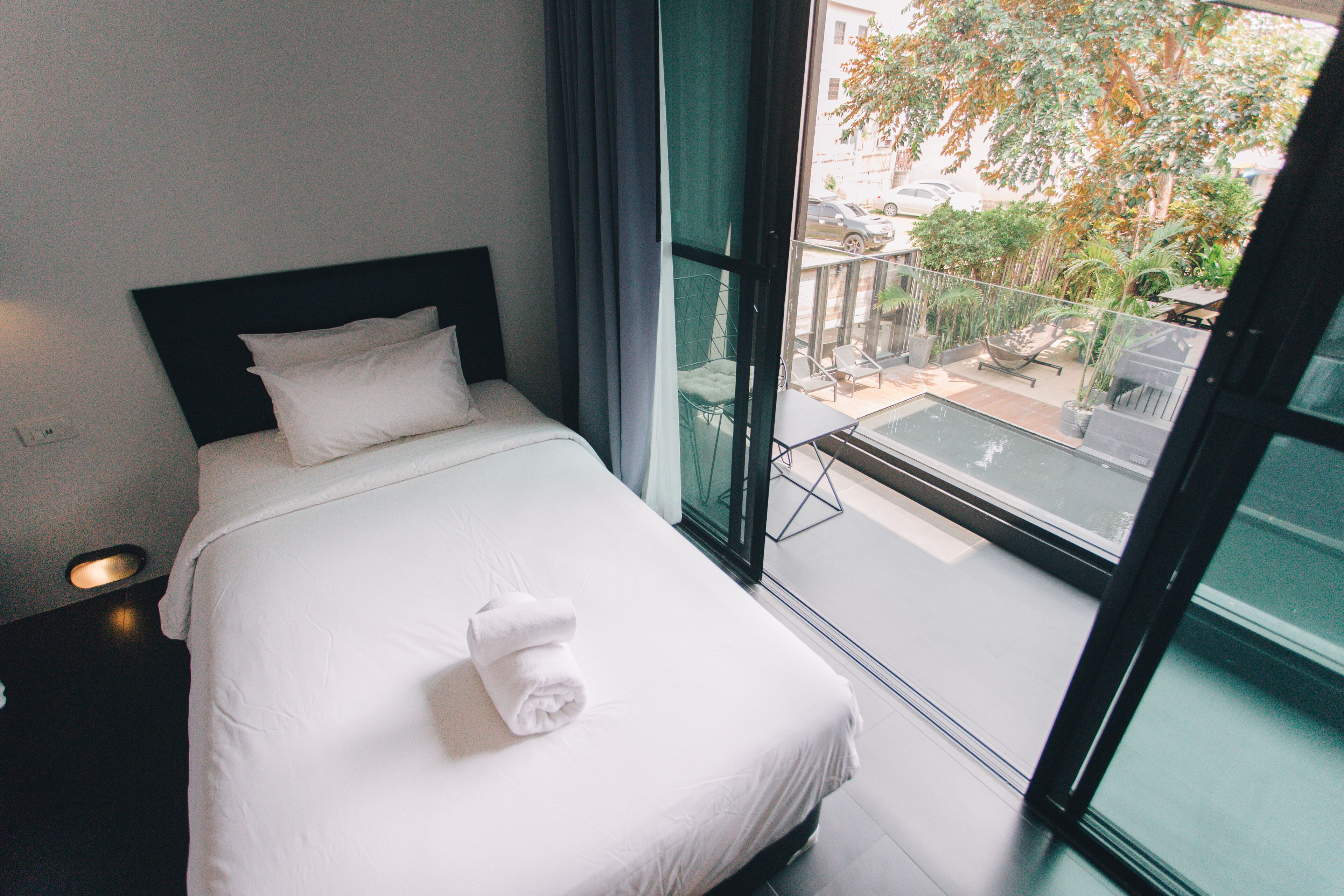 family room | 1 bedroom, minibar, in-room safe, desk