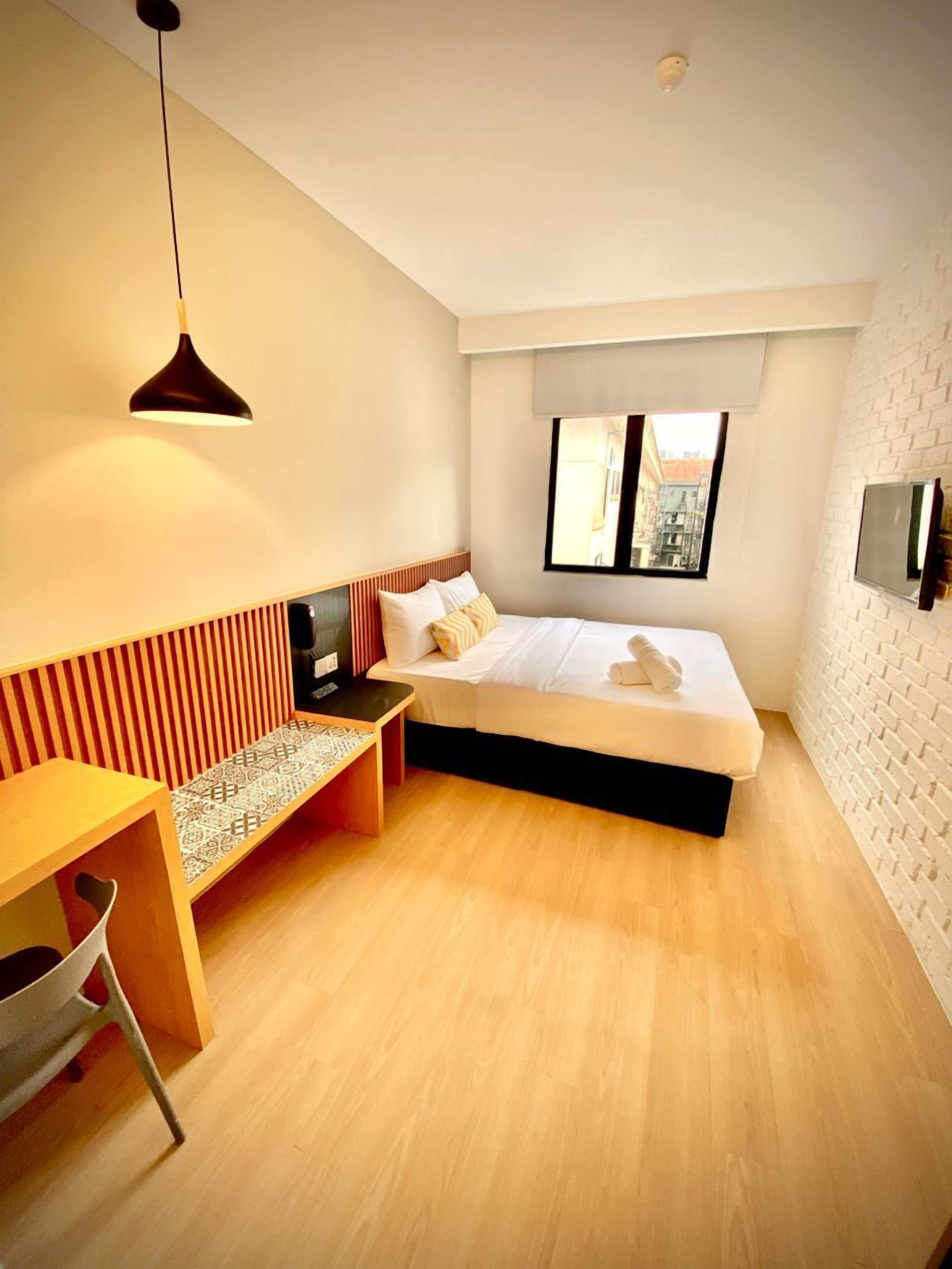 Quarto casal superior | Área de estar | Smart TV 32 polegadas com canais digitais