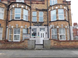 A corner building with a sign for 'Jasmine Guest House.' - The Jasmine Guest House (Bridlington)