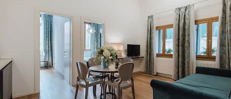 Deluxe Apartment, 2 Bedrooms | Living area | 35-inch flat-screen TV with satellite channels, TV