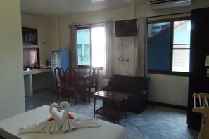 Junior Suite | Oppholdsområde | Flatskjerm-TV