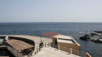 Standaard kamer, 1 twee- of 2 eenpersoonsbedden | Uitzicht op strand/zee