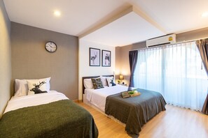 Habitación Deluxe con 2 camas individuales | Escritorio, espacio para trabajar con laptop y wifi gratis 
