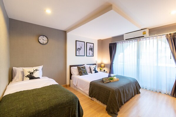 Habitación Deluxe con 2 camas individuales | Escritorio, espacio para trabajar con un portátil, wifi gratis