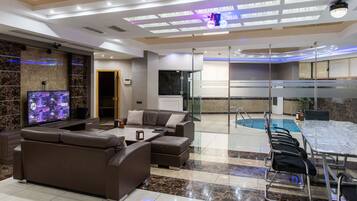 Premium Room, 3 Bedrooms, Private Pool, Garden Area | Living area | 65-inch TV with cable channels