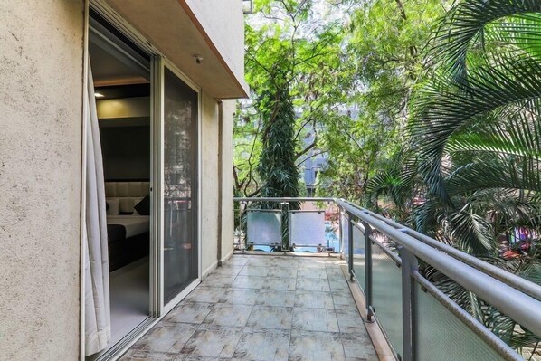 Deluxe Double Room | Terrace/patio - Magnus Vosiv Suites (Pune)