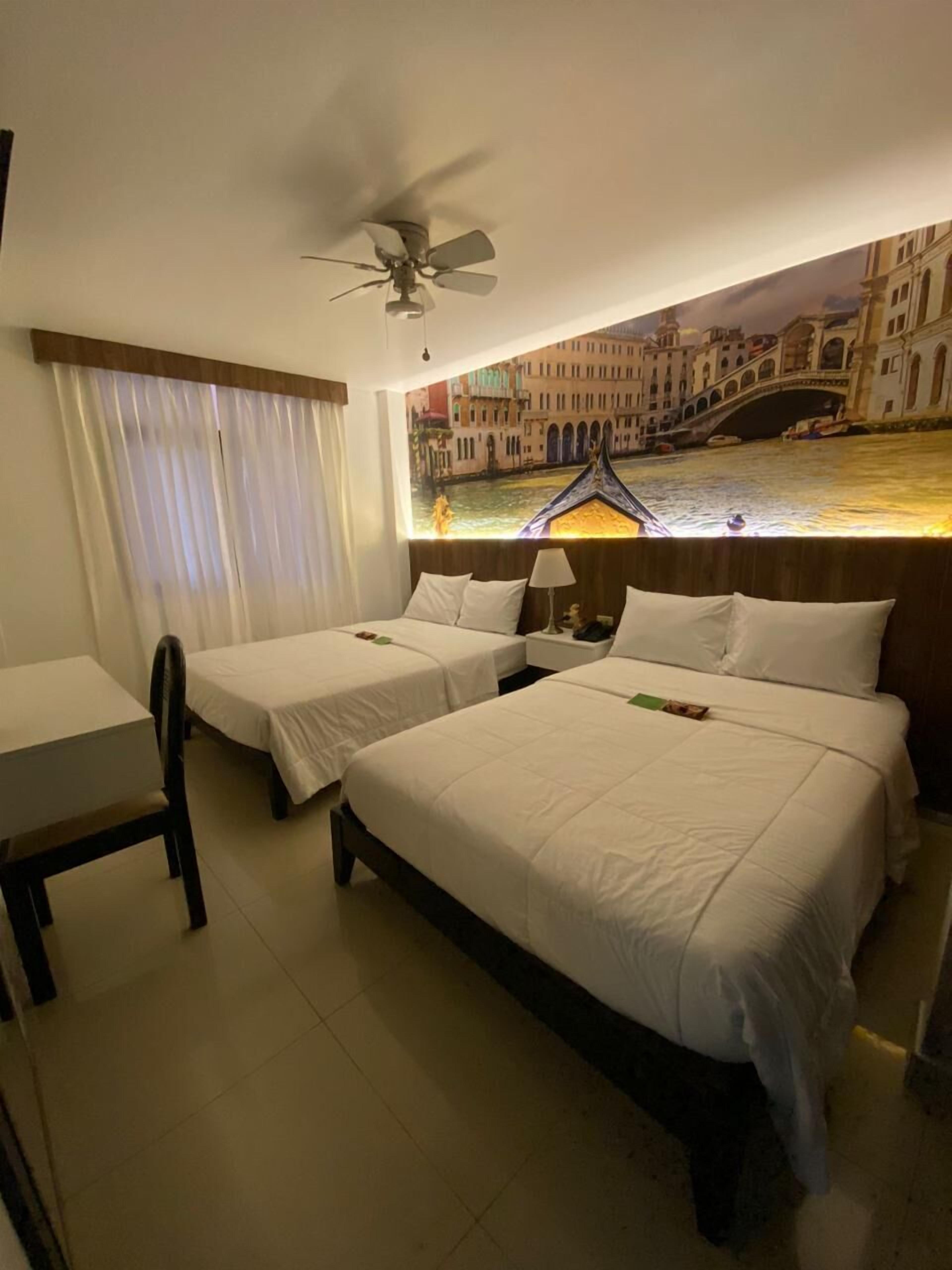 Desk, laptop workspace, free WiFi, bed sheets