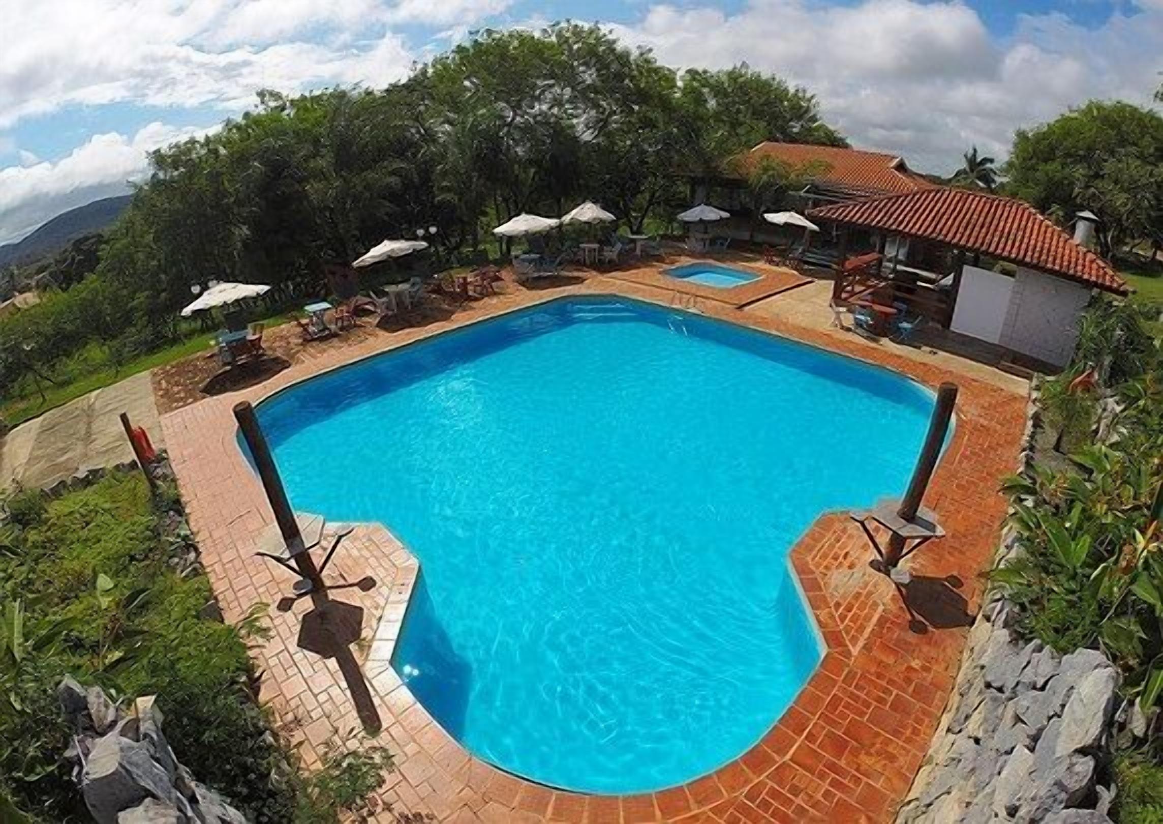 outdoor pool, pool umbrellas, pool loungers