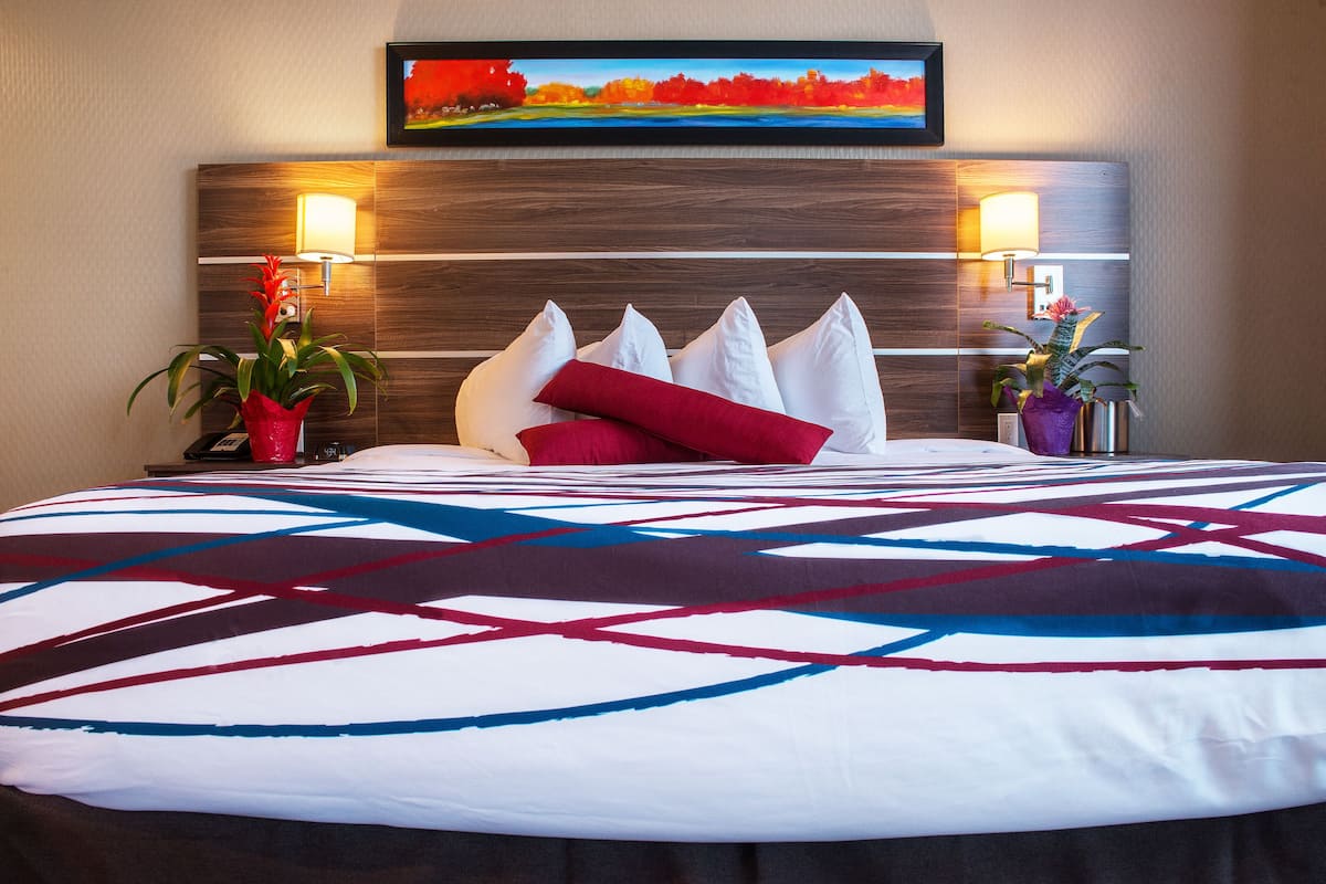 premium bedding, tempur-pedic beds, desk, laptop workspace