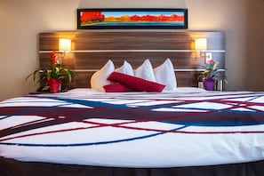 Premium bedding, Tempur-Pedic beds, desk, laptop workspace