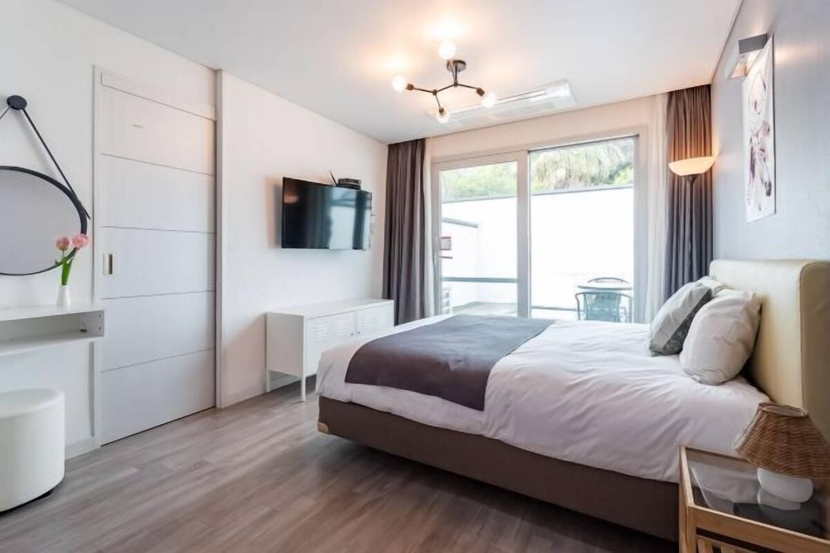 1 bedroom, premium bedding, individually decorated, blackout curtains