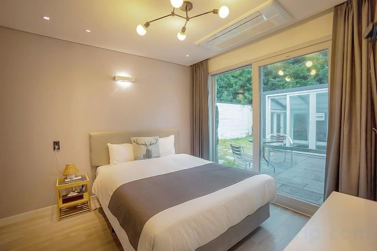 Premium bedding, blackout drapes, soundproofing, WiFi (free)