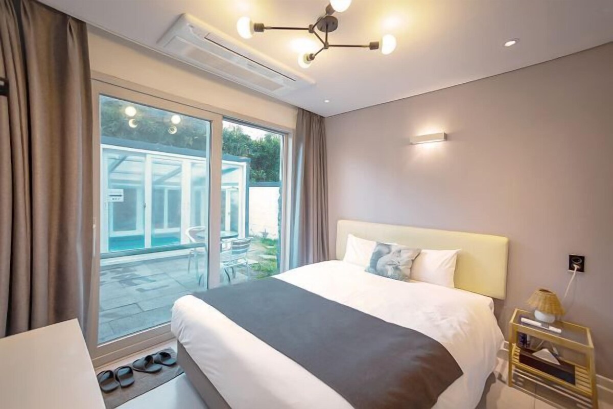 Premium bedding, blackout drapes, soundproofing, WiFi (free)