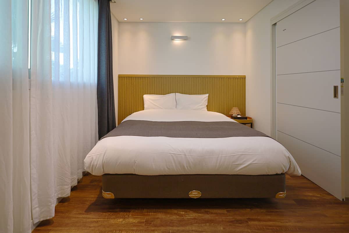 1 bedroom, premium bedding, individually decorated, blackout curtains