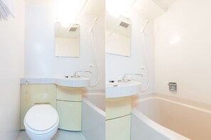A bathroom with a toilet, sink, and bathtub. - Hotel Toka (Tokyo)