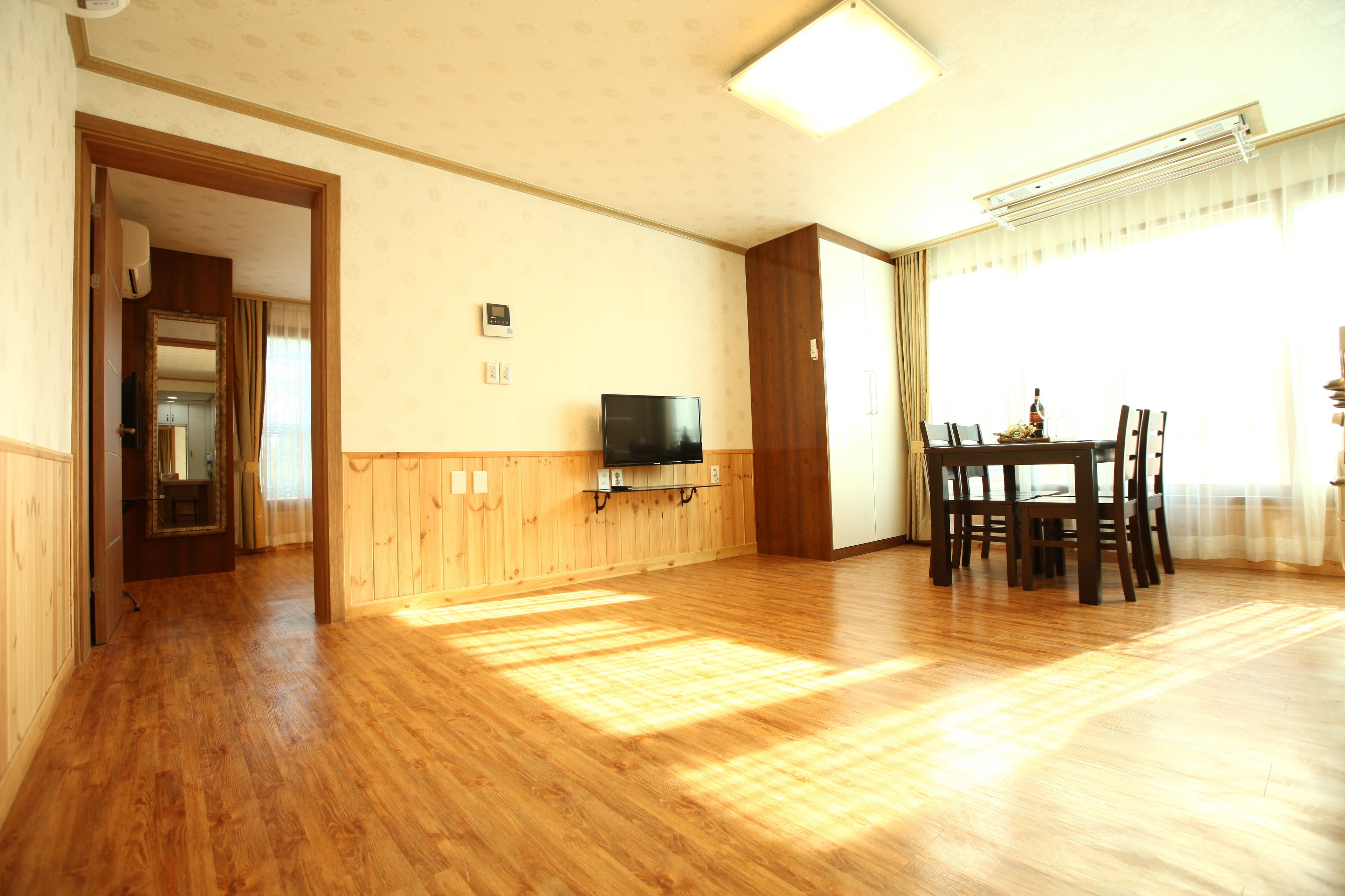 suite family room | living area | flat-screen tv, heated floors