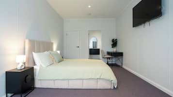 Superior Room | Desk, iron/ironing board, bed sheets
