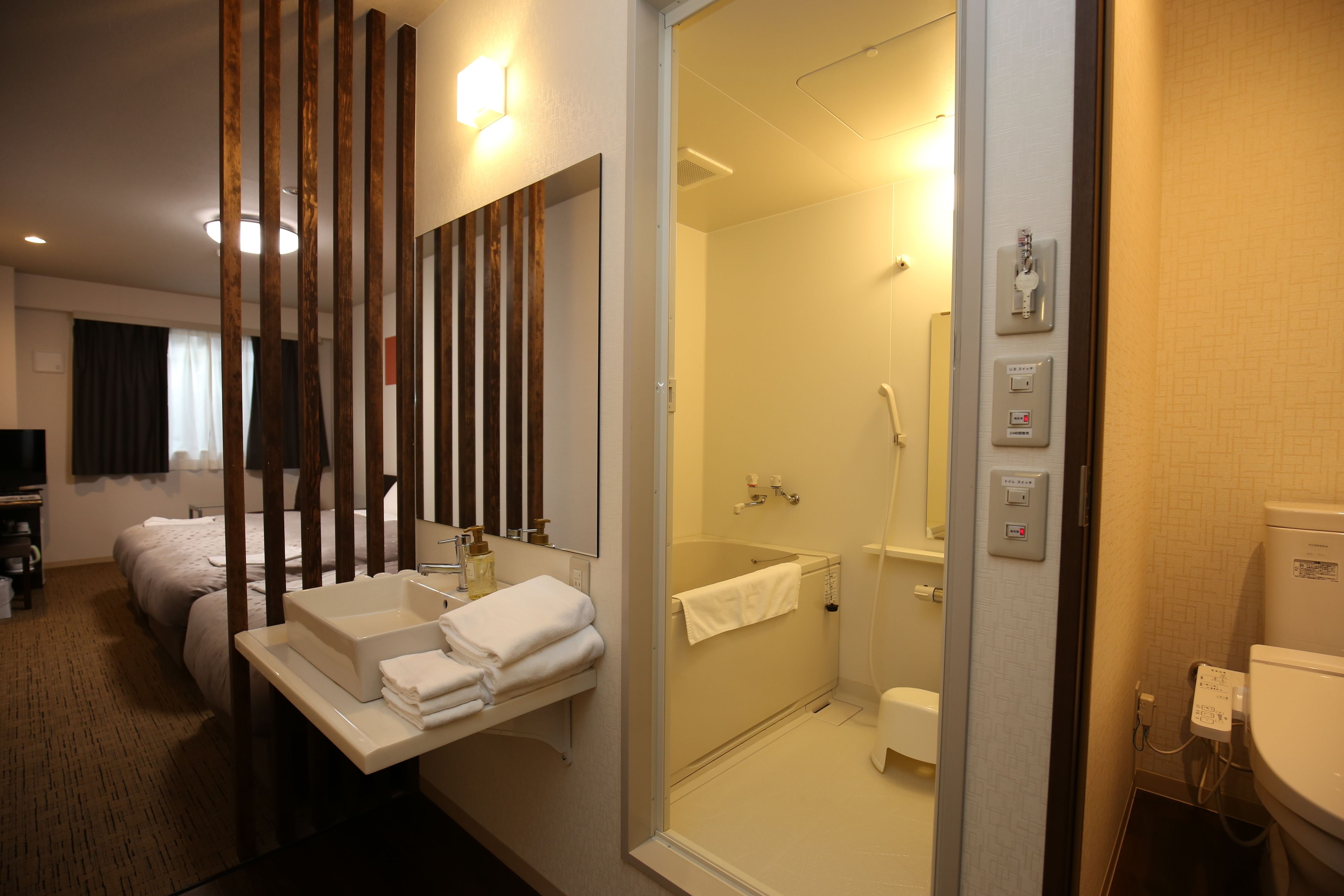 triple room, non smoking | bathroom | separate bathtub and shower, free toiletries, hair dryer, slippers