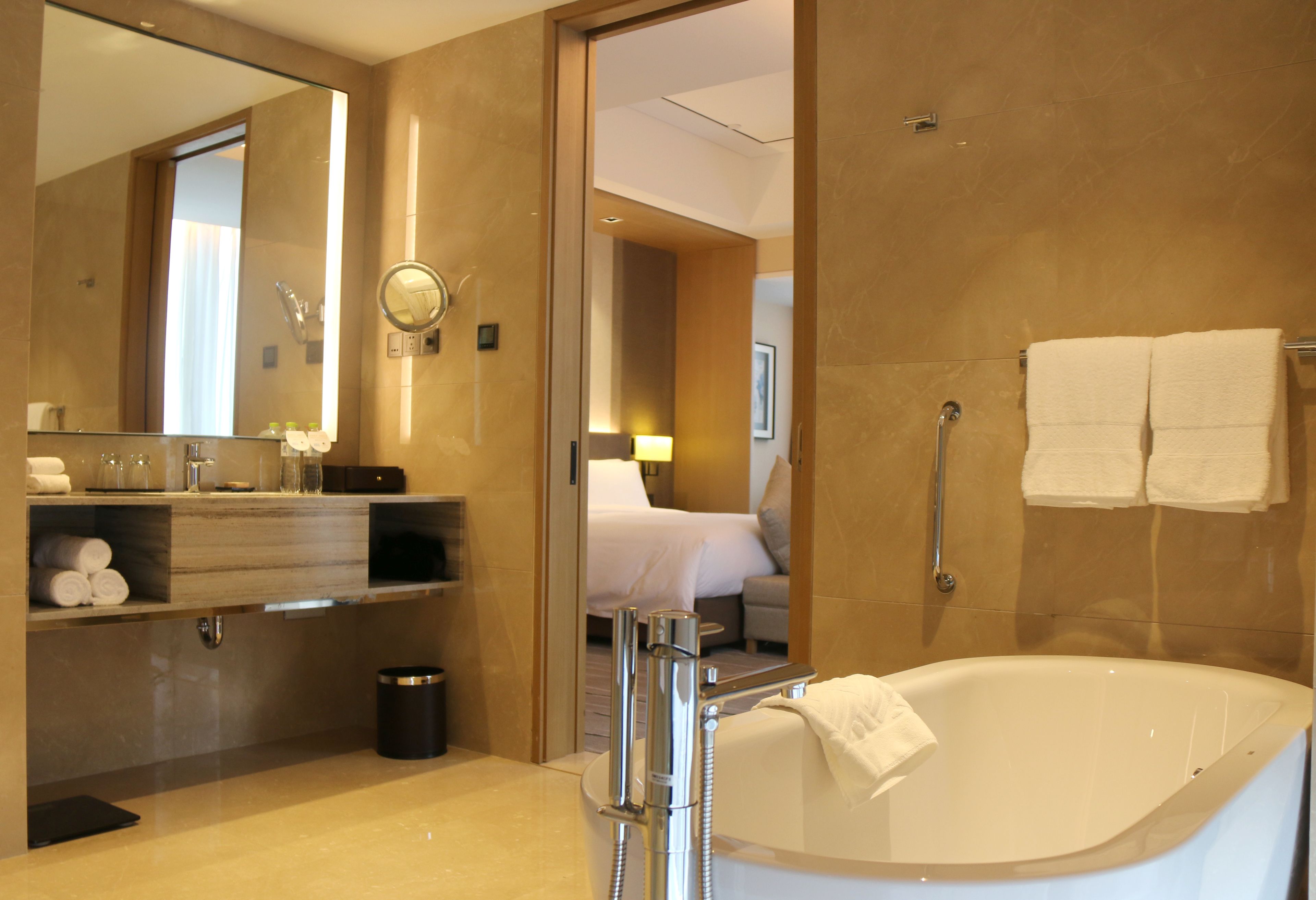 premier twin room, corner | bathroom | separate bathtub and shower, deep-soaking bathtub, rainfall showerhead