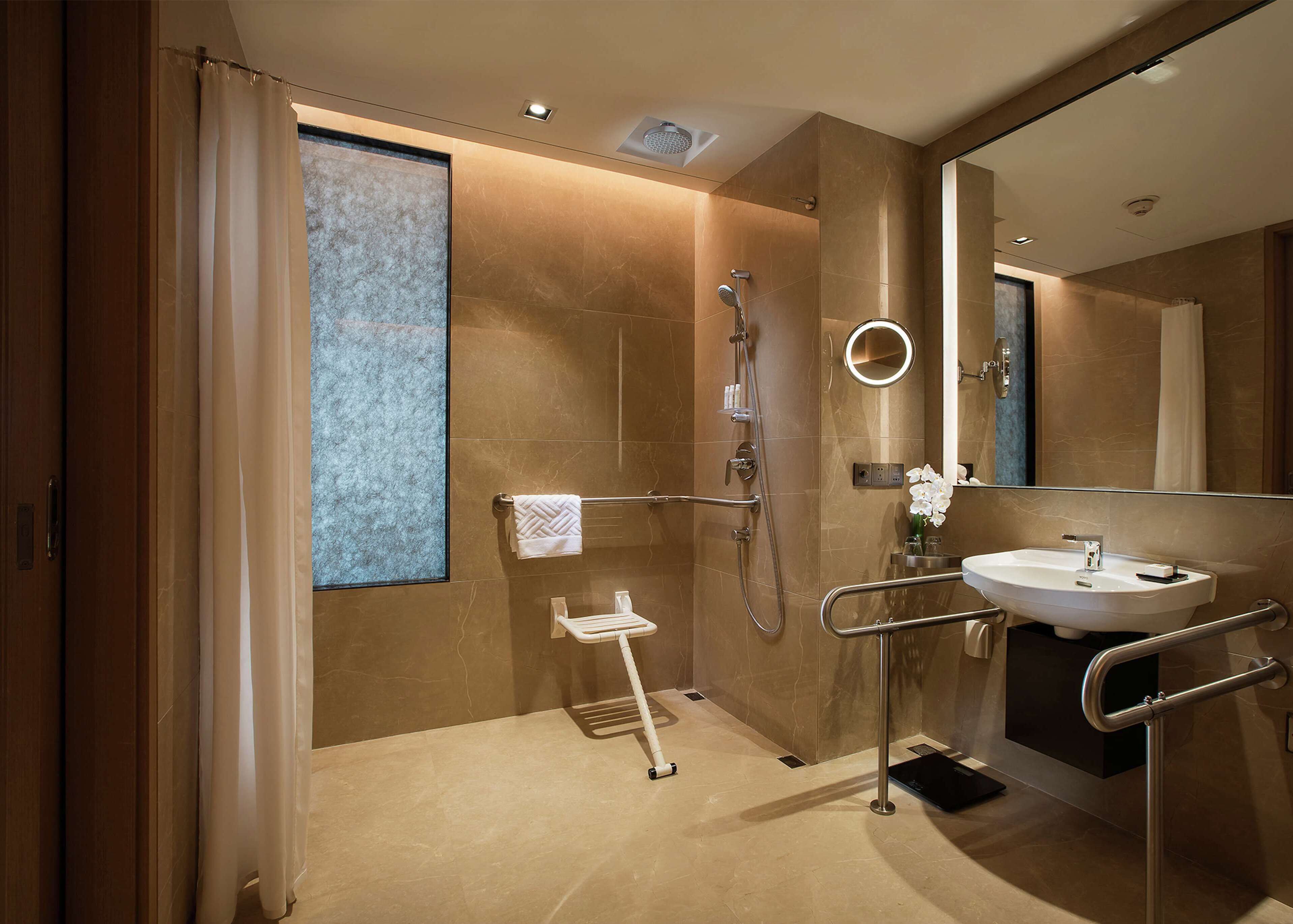 Basic Room, 1 King Bed, Accessible | Bathroom shower