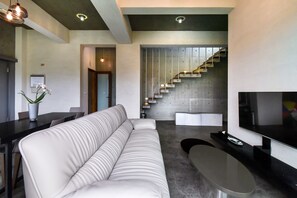 高级独立别墅, 2 间卧室, 海洋景观 | 客厅 | 液晶电视