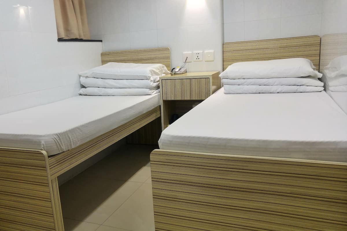Habitación con 2 camas individuales | Tabla de planchar con plancha y wifi gratis