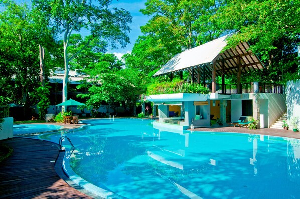 Outdoor pool, open 8 AM to 8 PM, pool umbrellas, pool loungers