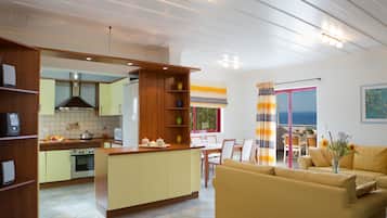 Villa | Private kitchen | Full-sized fridge, microwave, oven, stovetop