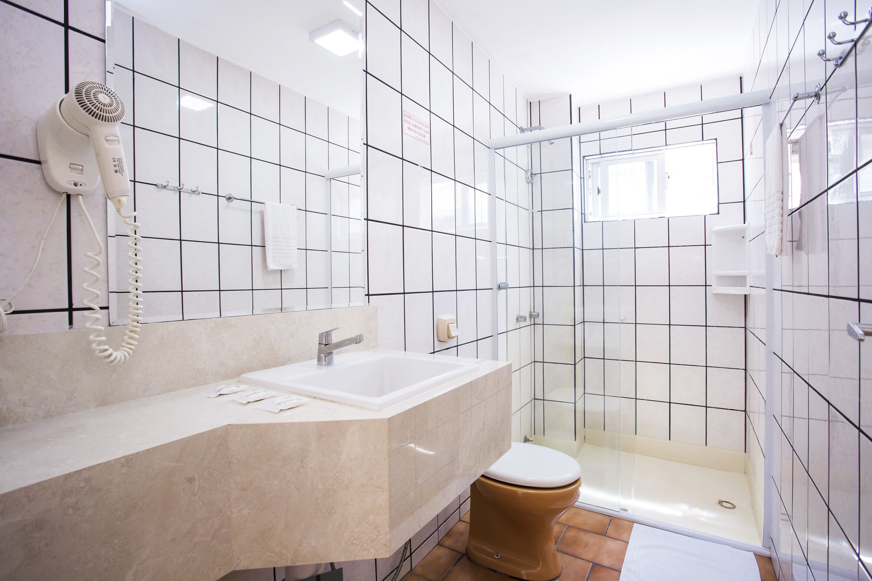 deluxe room | bathroom | shower, free toiletries, hair dryer, towels