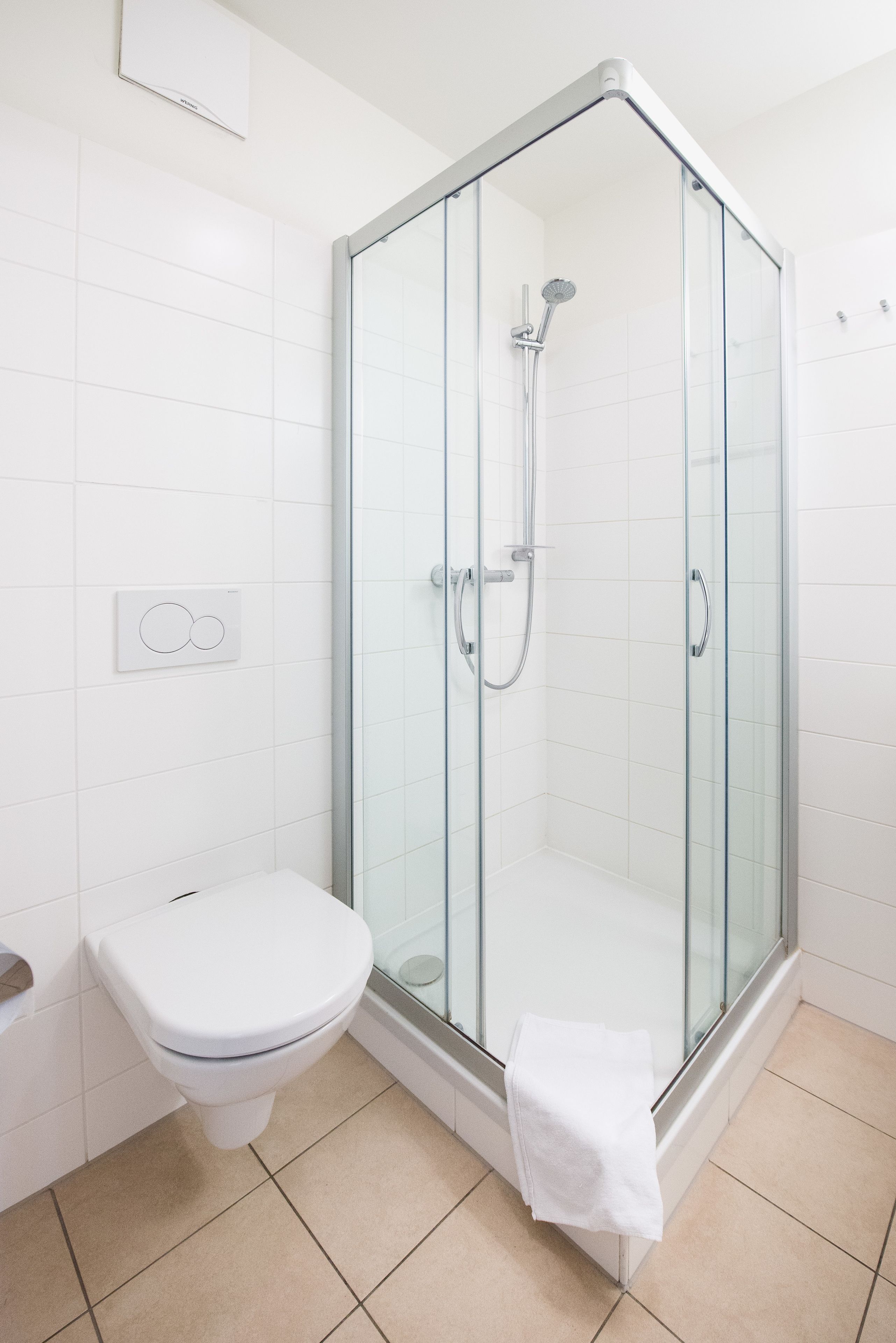 shower, free toiletries, hair dryer, towels