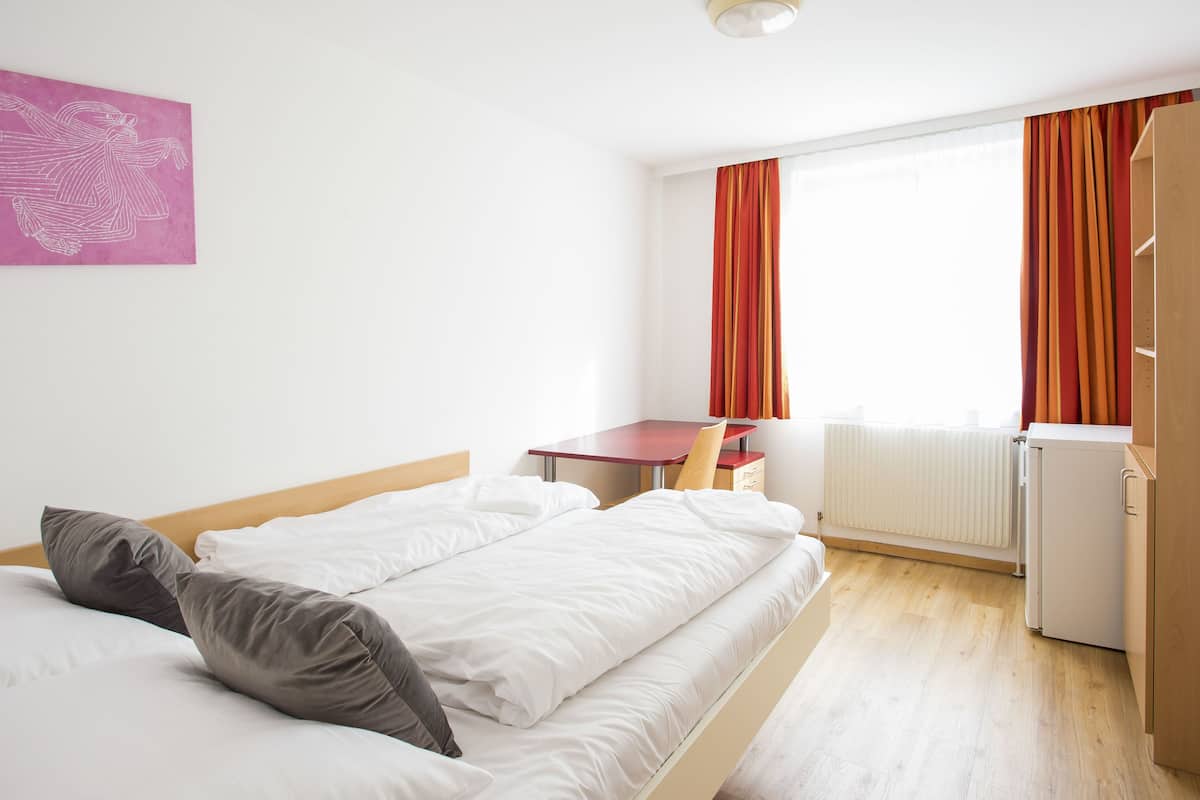 Premium bedding, in-room safe, iron/ironing board (on request)