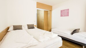 Triple Room, Private Bathroom | Premium bedding, in-room safe, iron/ironing board (on request) - myNext - Westbahnhof Hostel One (Vienna)