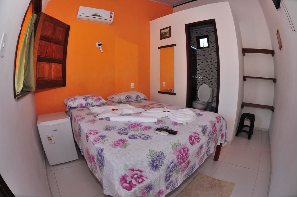 Quarto casal standard | Frigobar, ferros/tábuas de passar roupa, Wi-Fi de cortesia