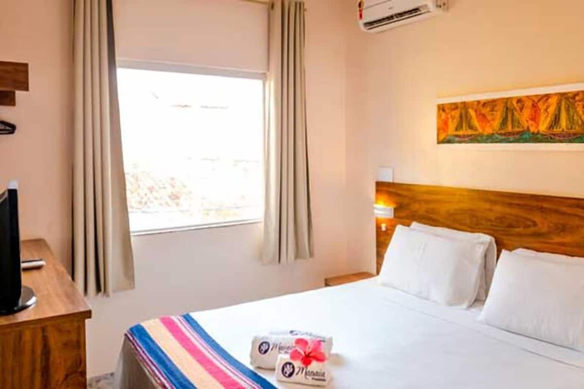 Habitación estándar con 1 cama doble o 2 individuales | Minibar, cortinas opacas, wifi gratis