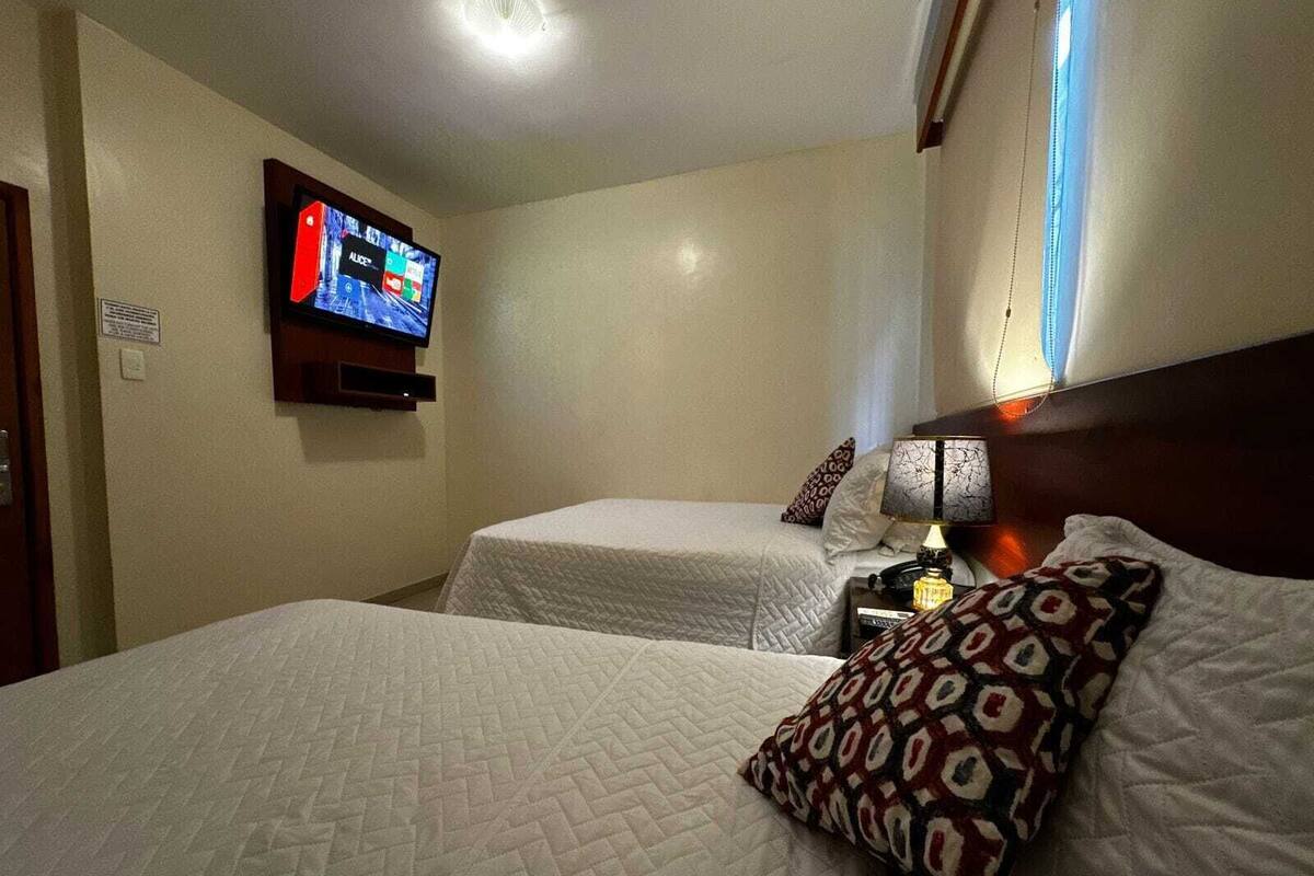 Standard Double Room, Multiple Beds, Private Bathroom, Tower | Premium bedding, free WiFi, bed sheets