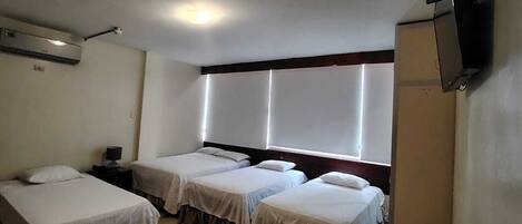 Suíte estúdio família, várias camas (Quintuple) | Roupas de cama premium, Wi-Fi de cortesia, roupa de cama